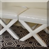 F52. Pair of white patent leather custom X stools. 18.5”h x 19”w x 19”d 